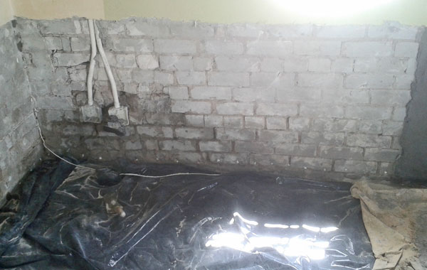 Damp Treatment of walls involves clearing and prepping the wall