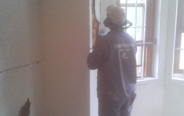 Internal Wall Damp Proofing starts with exposing the brickwork